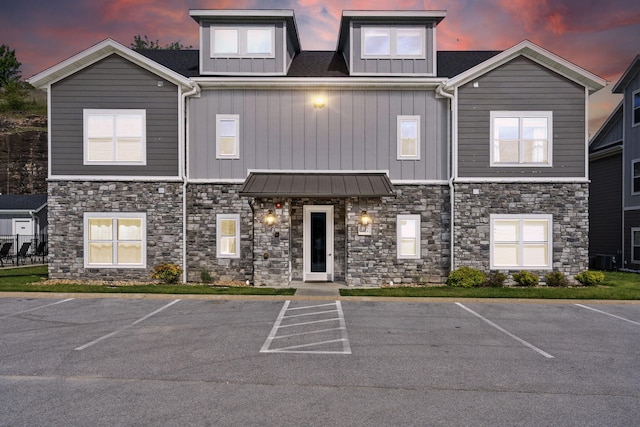 3112 S Vinyards Terrace Parkway Unit 4, Branson, MO 65616 - view of building exterior featuring uncovered parking and central air condition unit