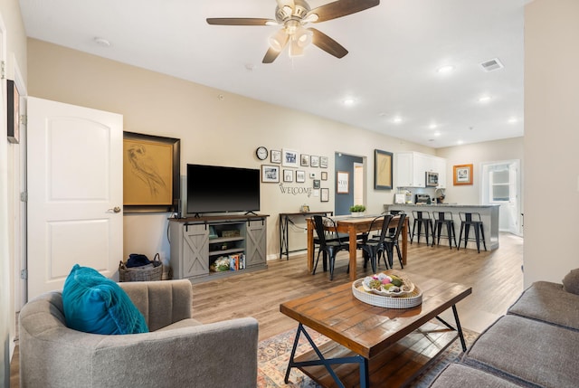 3112 S Vinyards Terrace Parkway Unit 4, Branson, MO 65616 - living room featuring light wood-type flooring, ceiling fan, recessed lighting, and baseboards