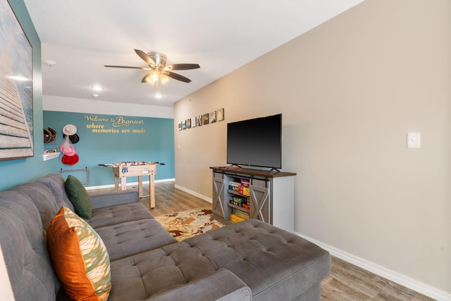 3112 S Vinyards Terrace Parkway Unit 4, Branson, MO 65616 - living area with wood finished floors, a ceiling fan, and baseboards