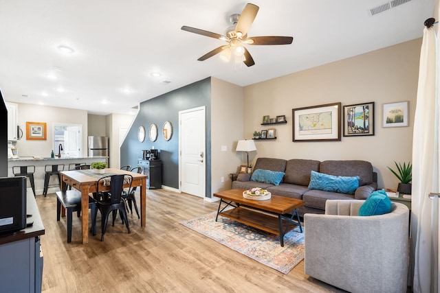 3112 S Vinyards Terrace Parkway Unit 4, Branson, MO 65616 - living room with ceiling fan, light wood finished floors, baseboards, and recessed lighting