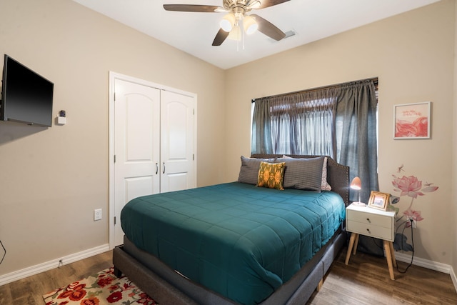 3112 S Vinyards Terrace Parkway Unit 4, Branson, MO 65616 - bedroom featuring wood finished floors, baseboards, a closet, and ceiling fan