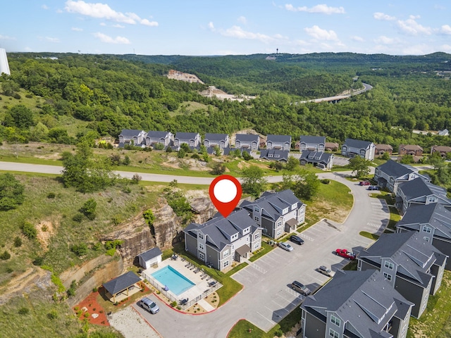 3112 S Vinyards Terrace Parkway Unit 4, Branson, MO 65616 - aerial view of residential area with a forest and a pool area