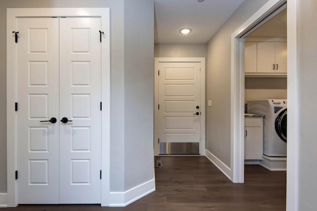 hallway featuring baseboards, washer / dryer, dark wood finished floors, and recessed lighting