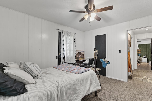 311 S Center St, Fordland, MO 65652 - carpeted bedroom with ceiling fan and wood walls