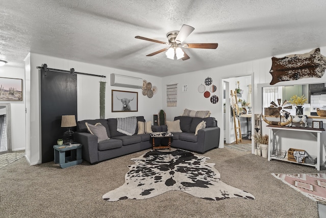 311 S Center St, Fordland, MO 65652 - living area with a barn door, a wall mounted air conditioner, a textured ceiling, carpet floors, and ceiling fan