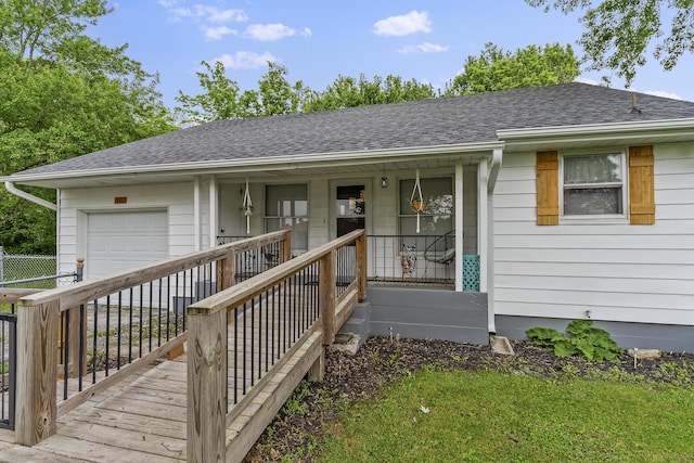 311 S Center St, Fordland, MO 65652 - view of front of home with a porch, roof with shingles, and an attached garage