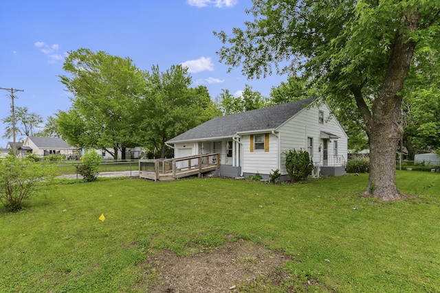 311 S Center St, Fordland, MO 65652 - rear view of house with a deck and roof with shingles