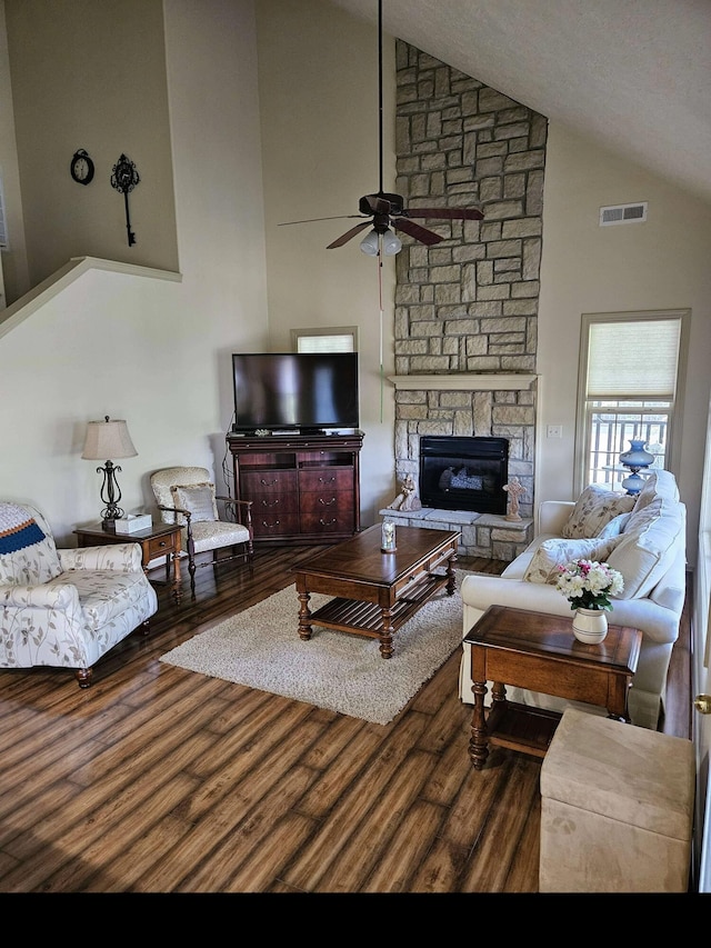 71 Birdie Ln Unit 3, Branson West, MO 65737 - living area featuring a ceiling fan, wood finished floors, high vaulted ceiling, and a stone fireplace