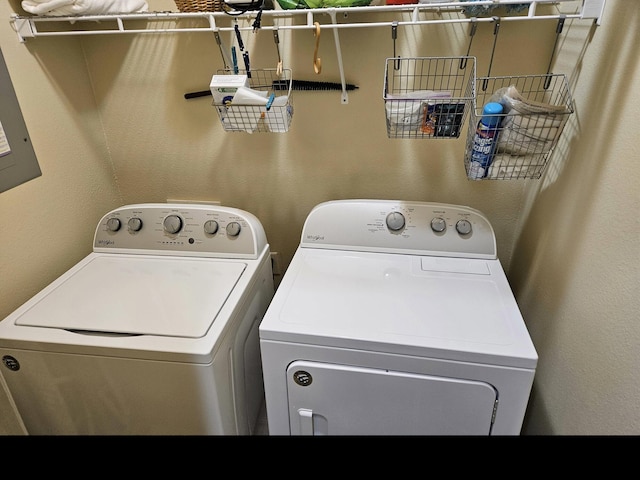 71 Birdie Ln Unit 3, Branson West, MO 65737 - washroom featuring washer and dryer and a textured wall