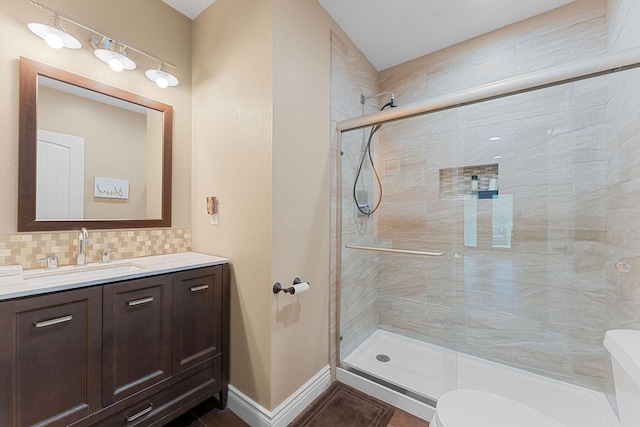 122 Thunder Ridge Ct, Branson, MO 65616 - full bathroom with toilet, a shower stall, vanity, and baseboards