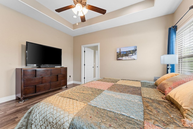 122 Thunder Ridge Ct, Branson, MO 65616 - bedroom featuring a raised ceiling, wood finished floors, baseboards, recessed lighting, and a ceiling fan