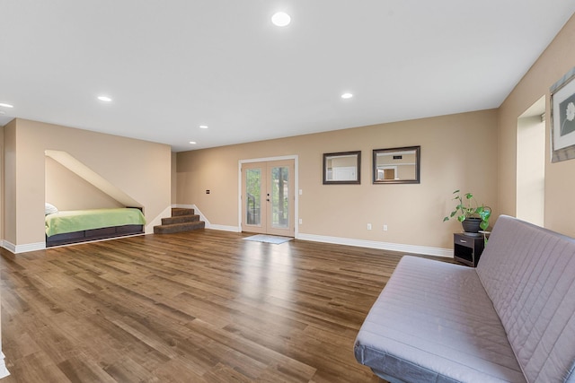 122 Thunder Ridge Ct, Branson, MO 65616 - unfurnished living room with wood finished floors, recessed lighting, baseboards, french doors, and stairs