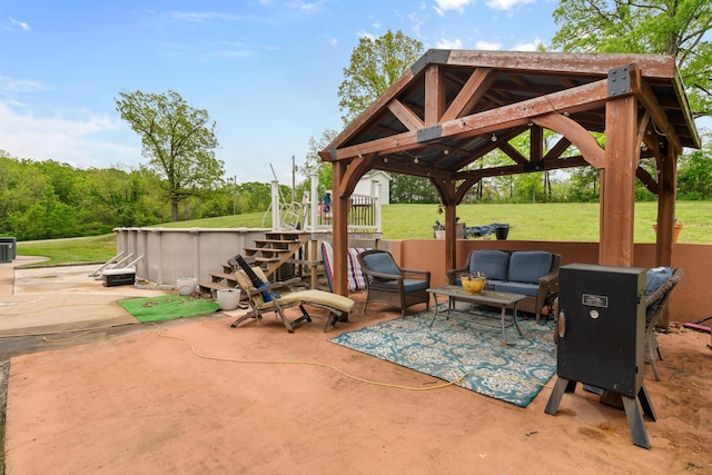 view of patio / terrace with a gazebo, an outdoor living space, and central AC unit