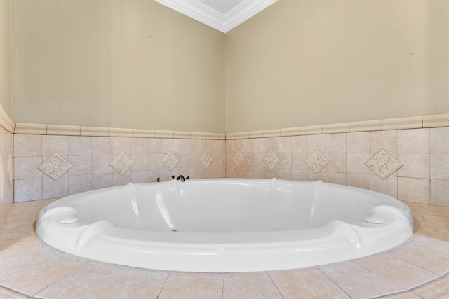 bathroom featuring crown molding and a garden tub