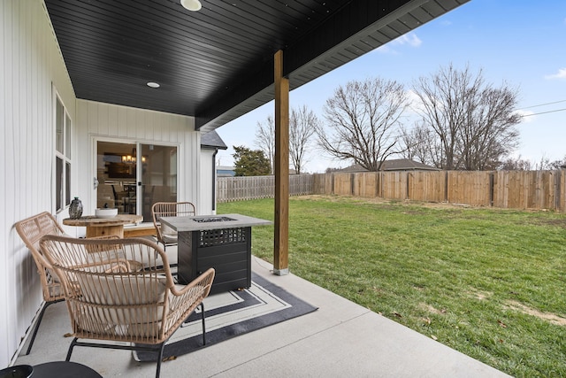 view of patio / terrace featuring an outdoor fire pit