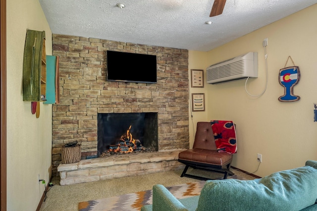 167 Motel Ln, Cape Fair, MO 65624 - living area with a wall unit AC, carpet floors, a textured ceiling, baseboards, and a ceiling fan