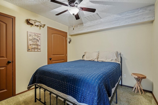167 Motel Ln, Cape Fair, MO 65624 - carpeted bedroom featuring baseboards, ceiling fan, and a textured ceiling