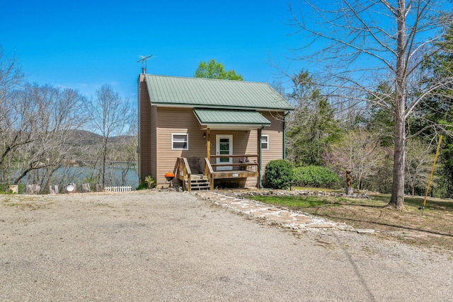 167 Motel Ln, Cape Fair, MO 65624 - view of front of house featuring metal roof and a porch