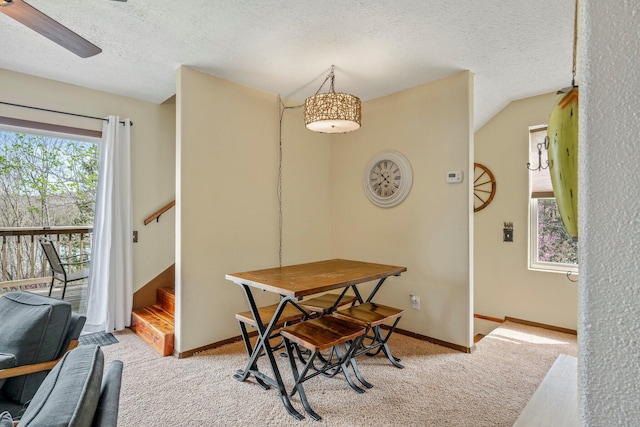 167 Motel Ln, Cape Fair, MO 65624 - dining area featuring light carpet, a textured ceiling, stairway, a ceiling fan, and baseboards