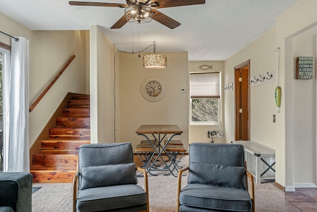 167 Motel Ln, Cape Fair, MO 65624 - living area with a textured ceiling, ceiling fan, and stairs