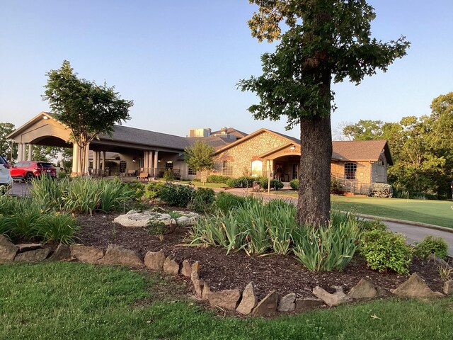 186 Bunker Ridge Dr Unit 2, Branson, MO 65616 - view of front of house with a front yard