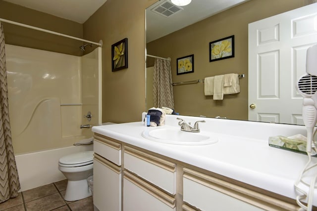 186 Bunker Ridge Dr Unit 2, Branson, MO 65616 - full bathroom with vanity, toilet, tile patterned floors, and shower / bathtub combination with curtain