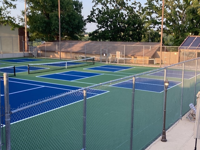 186 Bunker Ridge Dr Unit 2, Branson, MO 65616 - view of tennis court with fence and community basketball court