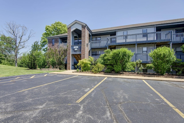 186 Bunker Ridge Dr Unit 2, Branson, MO 65616 - view of building exterior featuring uncovered parking