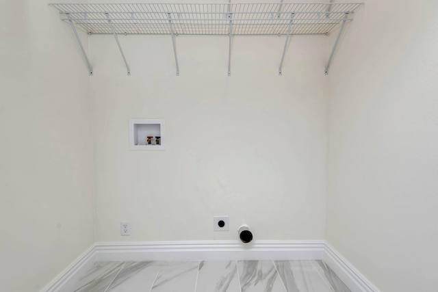308 S 6th Ave, Ozark, MO 65721 - clothes washing area with hookup for an electric dryer, baseboards, marble look tile flooring, and washer hookup