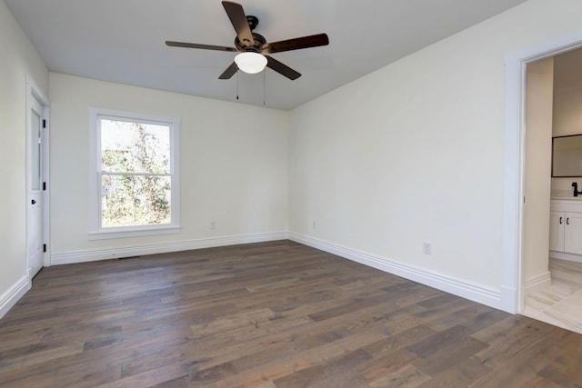 308 S 6th Ave, Ozark, MO 65721 - spare room with ceiling fan, wood finished floors, and baseboards