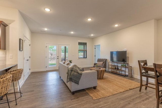 5955 S Farm Rd 163 205A, Springfield, MO 65810 - living area with wood finished floors, recessed lighting, french doors, and baseboards
