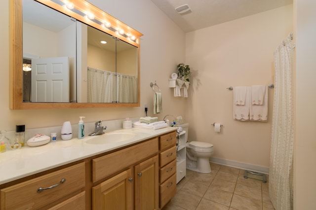 62 Turtledove Ln, Lampe, MO 65681 - full bath with vanity, toilet, tile patterned floors, and baseboards