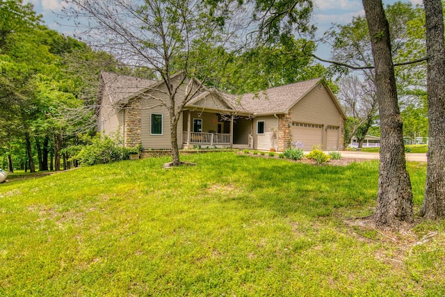 62 Turtledove Ln, Lampe, MO 65681 - single story home with a porch, a garage, a front yard, and concrete driveway