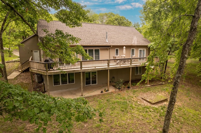 62 Turtledove Ln, Lampe, MO 65681 - back of house with a wooden deck, roof with shingles, a patio, and cooling unit