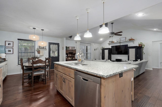 kitchen featuring stainless steel dishwasher, a sink, ceiling fan, dark wood-type flooring, and lofted ceiling