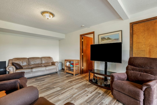 4949 S 196th Rd, Halfway, MO 65663 - living area with wood finished floors and a textured ceiling