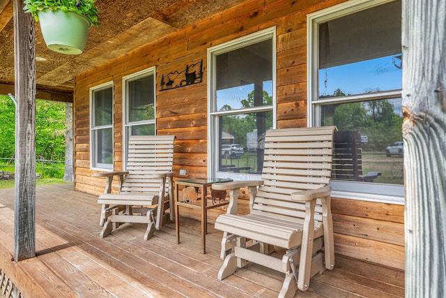 4949 S 196th Rd, Halfway, MO 65663 - wooden deck featuring covered porch