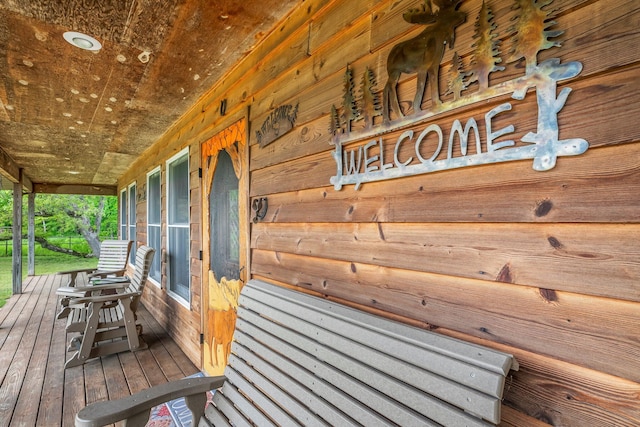4949 S 196th Rd, Halfway, MO 65663 - wooden terrace with covered porch