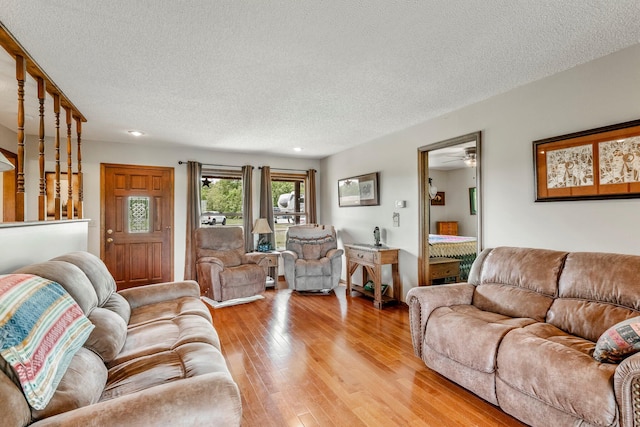 4949 S 196th Rd, Halfway, MO 65663 - living room featuring a textured ceiling, light wood-style floors, ceiling fan, and recessed lighting