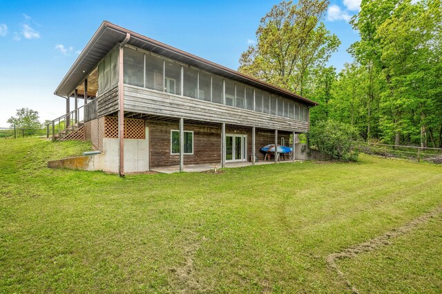 4949 S 196th Rd, Halfway, MO 65663 - rear view of house with a sunroom and a patio area