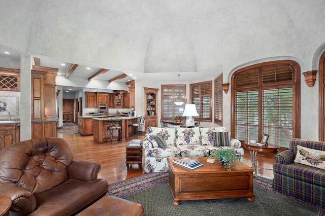 5245 S Stonehaven Dr, Springfield, MO 65809 - living room with light wood finished floors, recessed lighting, and beamed ceiling
