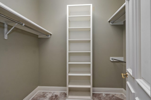 5245 S Stonehaven Dr, Springfield, MO 65809 - spacious closet featuring tile patterned flooring