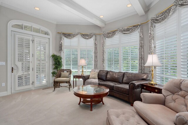 5245 S Stonehaven Dr, Springfield, MO 65809 - carpeted living area featuring healthy amount of natural light, beam ceiling, crown molding, and recessed lighting