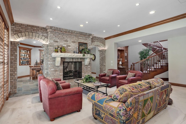 5245 S Stonehaven Dr, Springfield, MO 65809 - living area featuring recessed lighting, crown molding, stairs, a brick fireplace, and baseboards