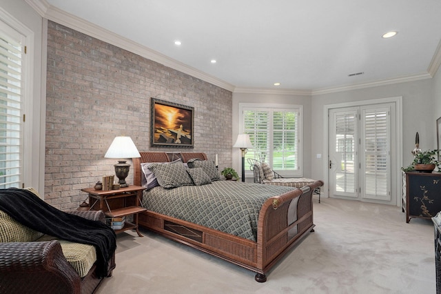 5245 S Stonehaven Dr, Springfield, MO 65809 - bedroom with light colored carpet, access to outside, recessed lighting, crown molding, and brick wall