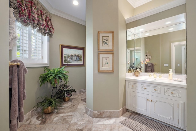 5245 S Stonehaven Dr, Springfield, MO 65809 - bathroom with crown molding, vanity, baseboards, and recessed lighting