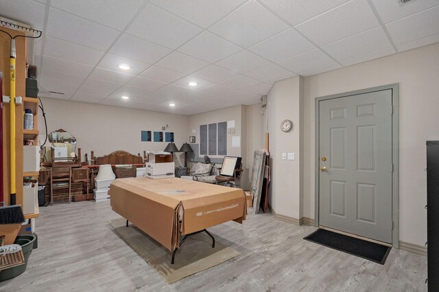 5245 S Stonehaven Dr, Springfield, MO 65809 - living room featuring a drop ceiling, light wood finished floors, and recessed lighting