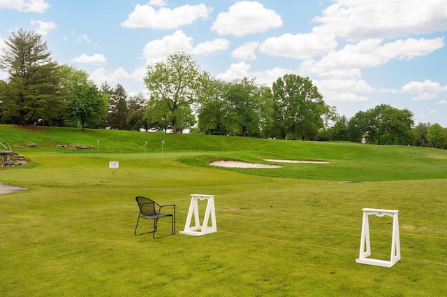5245 S Stonehaven Dr, Springfield, MO 65809 - view of home's community with view of scattered trees, view of golf course, and a lawn