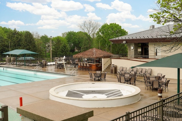 5245 S Stonehaven Dr, Springfield, MO 65809 - community pool featuring fence, a gazebo, and a patio