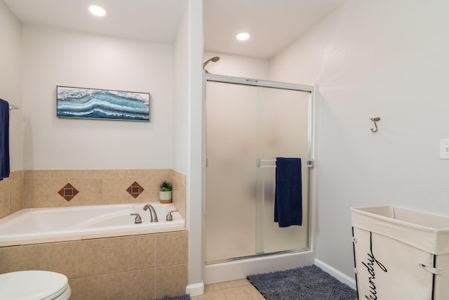 bathroom featuring a stall shower, a garden tub, tile patterned flooring, toilet, and recessed lighting